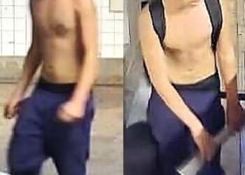 The shirtless suspect, as seen inside the Grand Avenue-Newtown subway station.