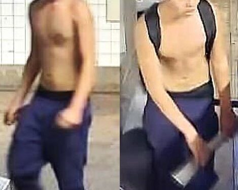 The shirtless suspect, as seen inside the Grand Avenue-Newtown subway station.