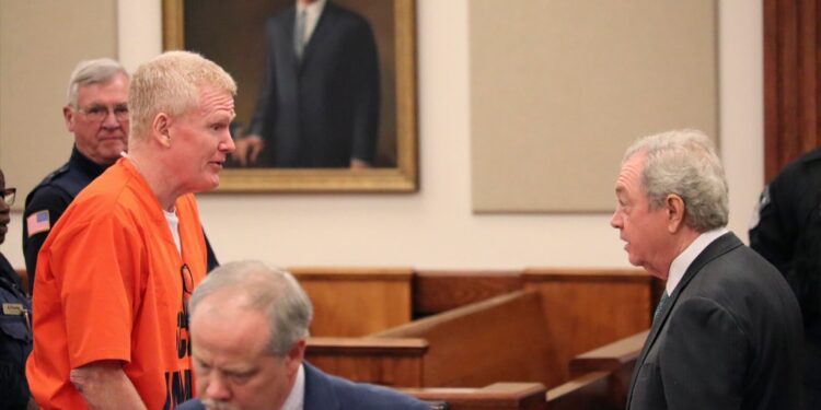Convicted murderer Alex Murdaugh speaks with his defense attorney, Dick Harpootlian, in Beaufort, S.C. on Friday, Nov. 17, 2023.