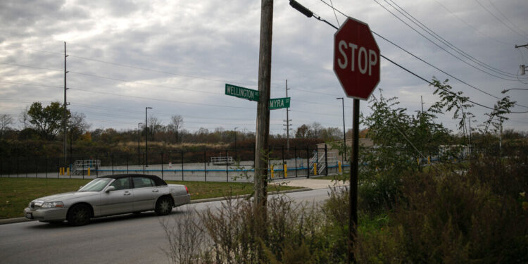 The cross street signs seen at the corner of Wellington Avenue and Myra Street in Akron.