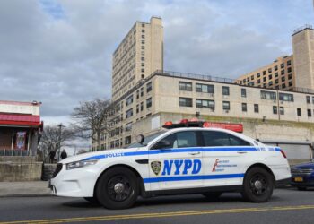 The officer was dragged a few feet when he tried to stop a fleeing driver at Warwick and Fulton streets in Cypress Hills, cops said.