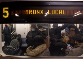 Passengers seen inside a No. 5 train in the Bronx.