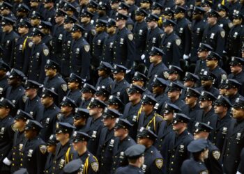A sea of newly minted officers at an NYPD graduation ceremony.