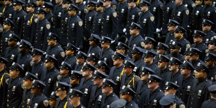 A sea of newly minted officers at an NYPD graduation ceremony.