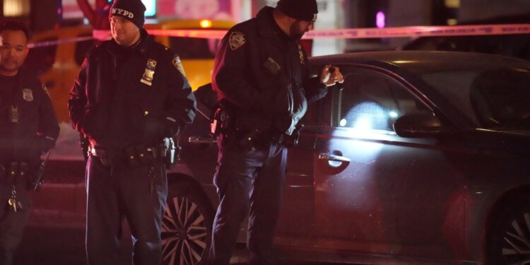Scene after an NYPD officer was injured by a driver.