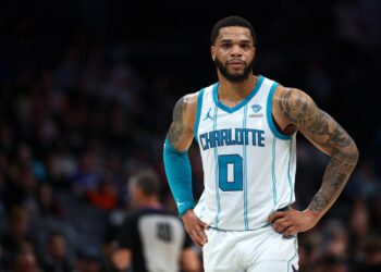 Miles Bridges #0 of the Charlotte Hornets looks on during the second half of the game against the Toronto Raptors at Spectrum Center on February 07, 2024
