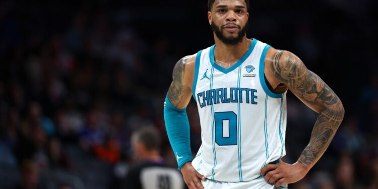 Miles Bridges #0 of the Charlotte Hornets looks on during the second half of the game against the Toronto Raptors at Spectrum Center on February 07, 2024