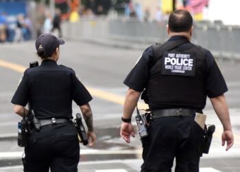 Police officers walking through Manhattan