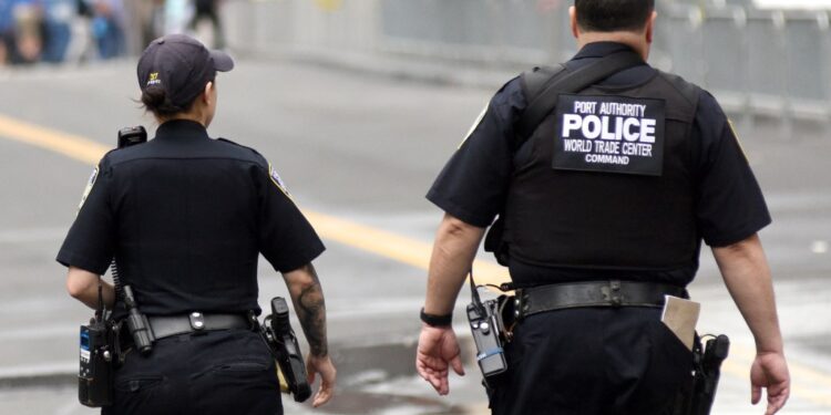 Police officers walking through Manhattan