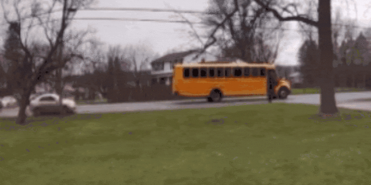 New York school bus driver saves young girl as careless driver speeds past while students exit at stop