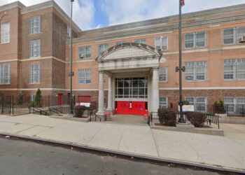 Four male students were slashed during a Monday morning brawl at Port Richmond High School, cops said.