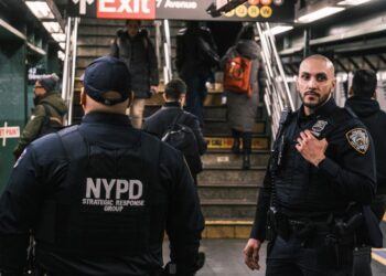 NYPD cops patrol the subway