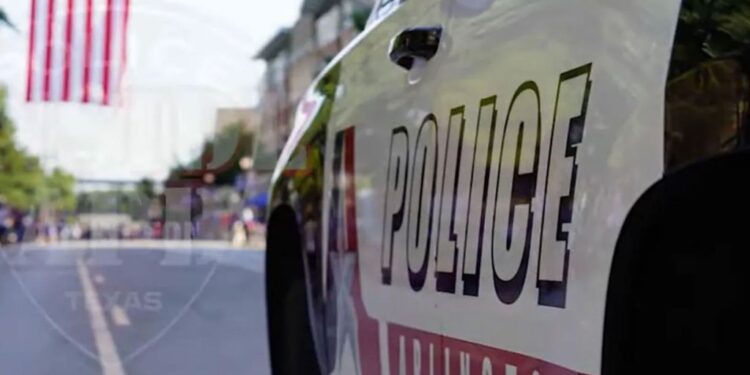 Close-up view of a police car at Bowie High School in Texas following a student shooting incident