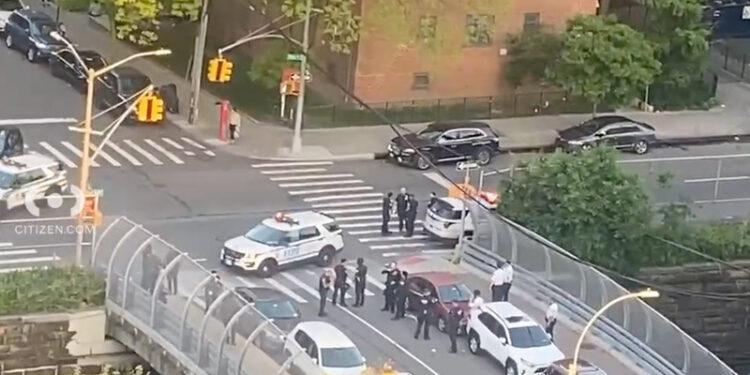 A screenshot from the Citizen App shows the scene of a collision where NYPD while responding to shooting of 13-year-old boy in the Bronx at 450 East 169th Street.