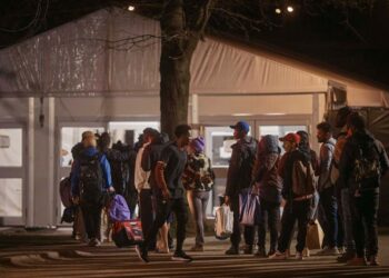 A migrant attacked and bit a security guard at the shelter on Randall's Island when the guard attempted to break up a fight between the man and his wife on Monday.