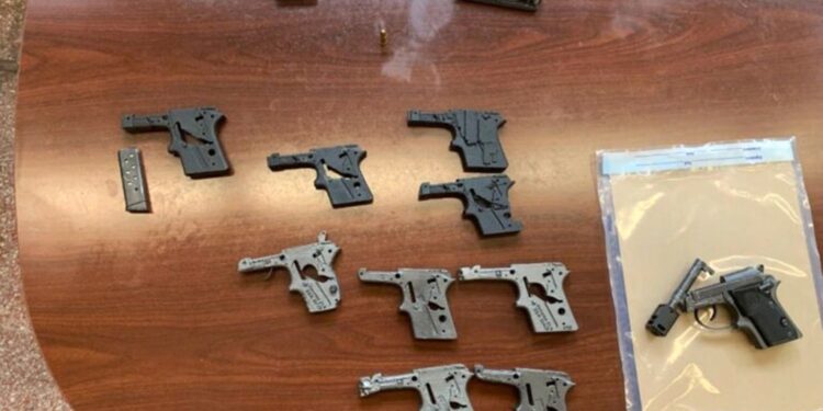 The pile of guns recovered from Guerrero's home.