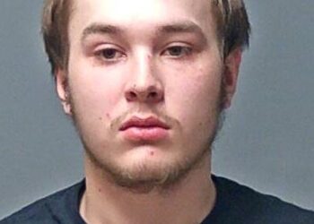 faces multiple charges after he knocked over a portable toilet with a woman and child inside.