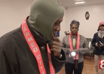 When the armed volunteers are not on the streets, the group monitors video feeds from a dozen drones hovering over the neighborhood, and 75 home surveillance cameras in the neighborhood.