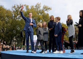 Governor Gavin Newsom, alongside his wife Jennifer Lynn Siebel Newsom and their four children, being sworn in for his second term by Chief Justice Patricia Guerrero at the Capitol Mall in Sacramento, CA.
