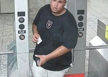 The still-at-large sicko pummeled and raped the 53-year-old victim inside a Flushing business, cops said.