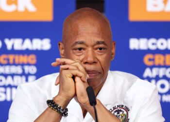 New York Mayor Eric Adams holding a press conference with his staff at City Hall