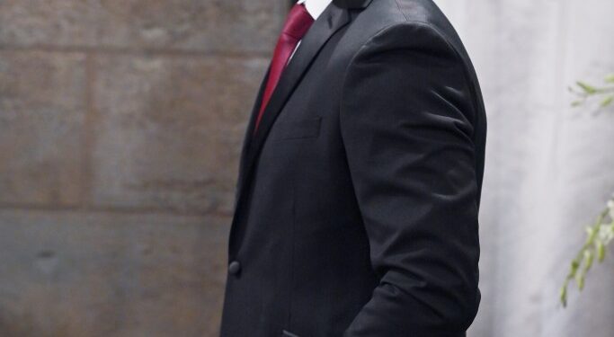 Johnny Wactor in a suit on the set of General Hospital, episode 14811