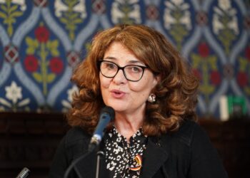 Dame Diana Johnson MP speaking into a microphone at a press conference on Infected Blood Inquiry report in Westminster, London