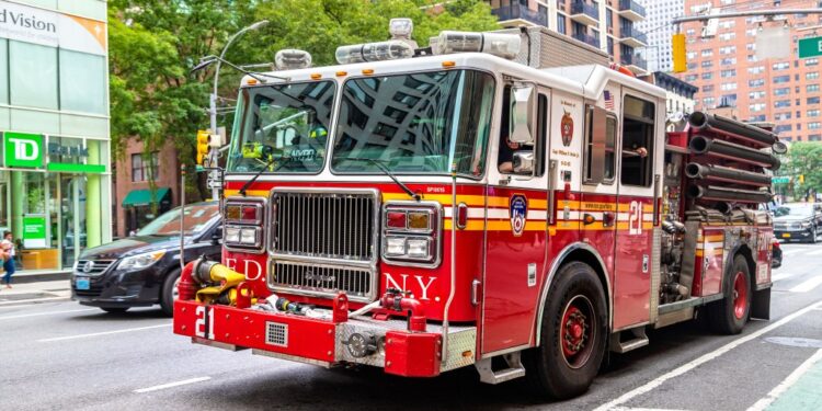 NEW YORK CITY, USA - MARCH 15, 2020: Fire truck responding to a emergency call in Manhattan in New York City, USA