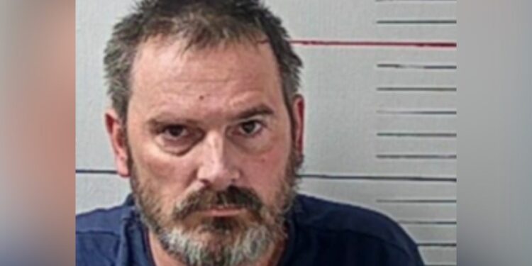 Two men wearing Halloween masks while breaking into a comic bookstore