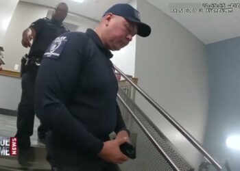 Cop is caught red-handed with the green