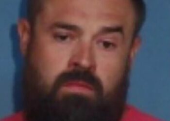 Arkansas father Aaron Spencer was arrested for fatally shooting his teenage daughter's alleged stalker.