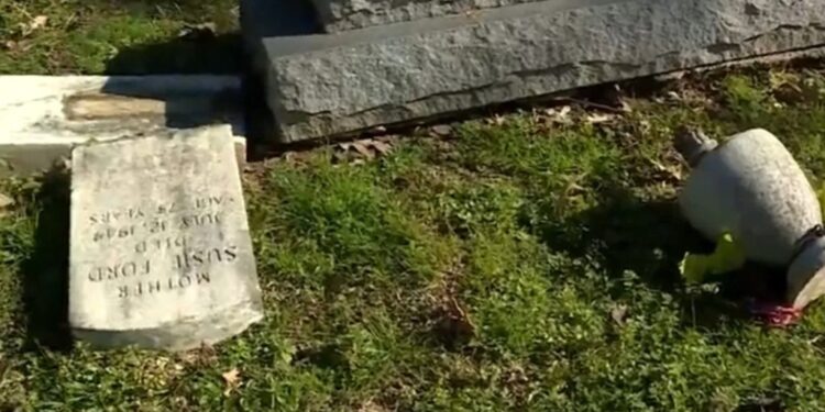 Gravestones knocked down by fired employees of New Park Cemetery in Memphis.