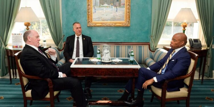 New York Mayor Eric Adams, right, meeting with President-elect Donald Trump's incoming "border czar" Tom Homan, left, and President Joe Biden's Department of Homeland Security Official Kenneth Genalo at Gracie Mansion, in New York, Thursday, Dec. 12, 2024. (