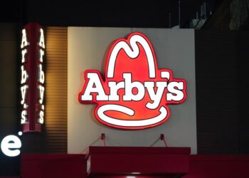 The unruly customer was charged with aggravated assault, aggravated child abuse and disorderly conduct.