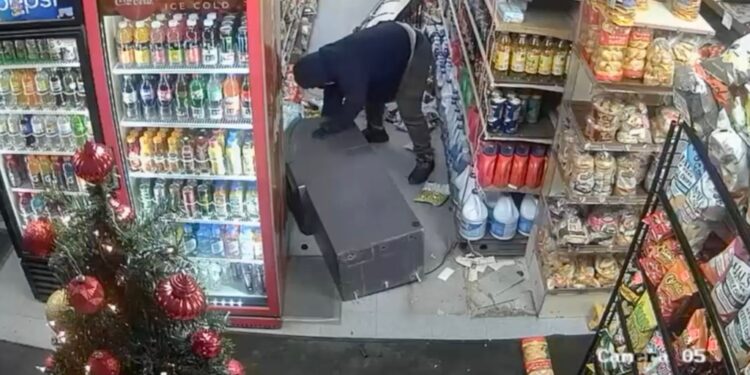 surveillance video from December 23, 2024, at approximately 2:20 a.m., shows one wearing a hoodie and gloves stealing an ATM from a grocery store at 75-10 31 Avenue in Jackson Heights, Queens.