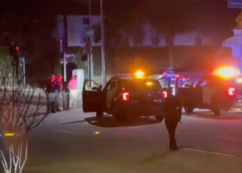 Police footage showed squad cars surrounding the Waymo car used in a suspected robber's escape.