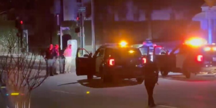 Police footage showed squad cars surrounding the Waymo car used in a suspected robber's escape.