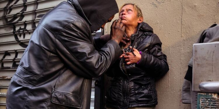 A woman getting injected with drugs at the Hub in the Bronx on Dec. 29, 2024.