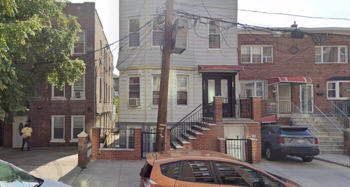 A 55-year-old woman was hospitalized after she was struck in the forehead by a stray bullet on Sunday night.