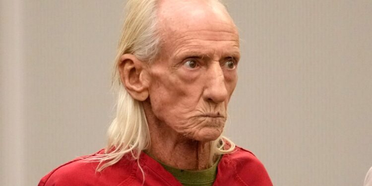 Joseph Czuba, 71, stands before Circuit Judge Dave Carlson for his arraignment at the Will County, Ill., courthouse, Oct. 30, 2023, in Joliet, Ill.