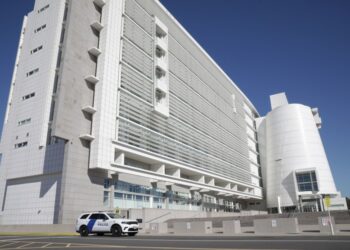 The United States District Court in Central Islip is shown.