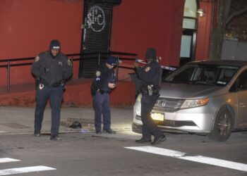Cops at the scene of a Sunday morning shooting that left a Bronx man dead.
