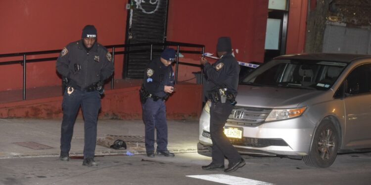 Cops at the scene of a Sunday morning shooting that left a Bronx man dead.