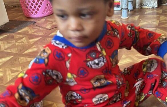 Undated photo of toddler Kyng Royal Foster sitting on the floor in pajamas