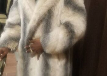 bishop in a striped fur coat