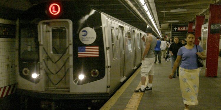The L Train was voted best subway in NYC, here seen on Friday, 07/25/03; here seen pulling into Myrtle Ave. in Brooklyn.