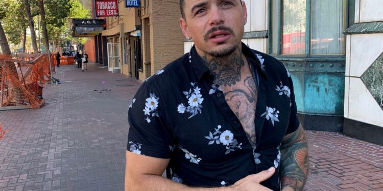 Ricci Wynne walks down a San Francisco street.