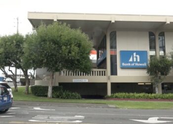 Security guards at the BANK in PLACE called police and later arrested Marchan.