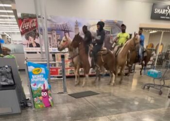 The video captured the four men in the Baker Walmart on their horses.