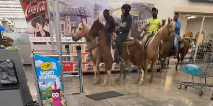 The video captured the four men in the Baker Walmart on their horses.